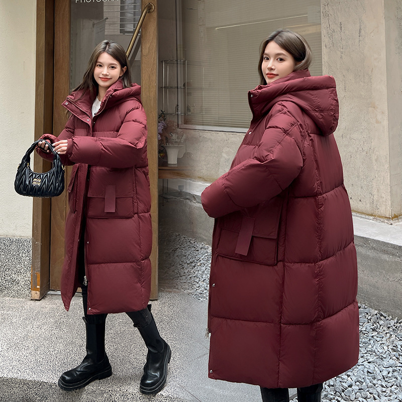 2024 invierno nuevo engrosado suelto largo sobre la rodilla ropa de algodón para estudiantes coreanos encapuchados de bolsillo grande abrigo de algodón