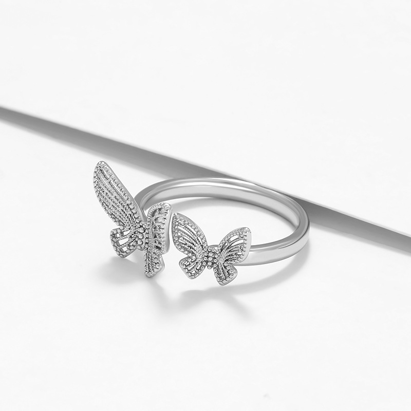Xuping joyería nueva aleación dorada de encaje mariposa anillo de nicho ligero de lujo abierto anillo índice