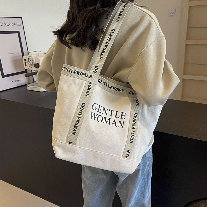 Moda simple lienzo impreso carta bolsa de hombro 2024 gran capacidad de trabajo de alta calidad bolso de mano