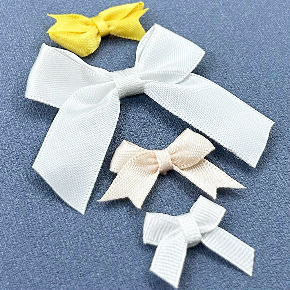 服装辅料锦纶缎带蝴蝶结 涤纶丝带自动机打蝴蝶花 包布手打结花仔