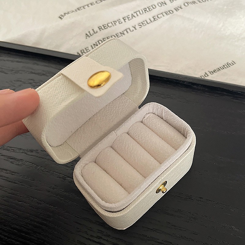 Caja de joyería de lujo ligera de comercio exterior viajes portátiles caja de anillo con cremallera estilo de bolsillo joyería caja de almacenamiento