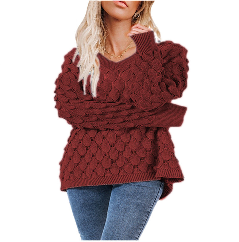 Europeo y americano invierno nuevo suéter de punto de pluma hueco cuello en V manga larga suéter femenino ventas directas de fábrica