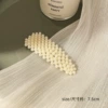 17# small pearl drop clip.