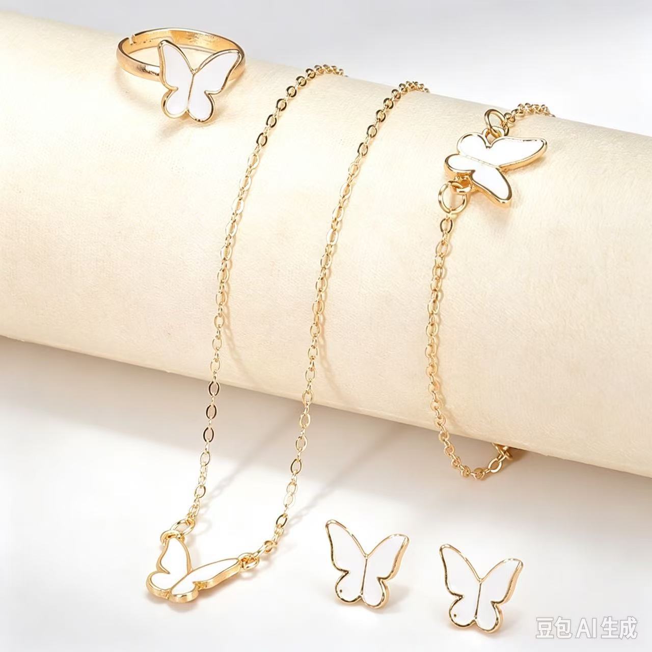 New European and American jewelry women's fashion temperament personality butterfly necklace earring ring bracelet 4 piece set wholesale
