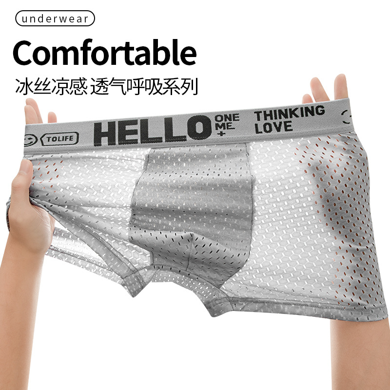 Pantalones interiores de hombre, agujeros de ojo de malla de hielo antibacteriana, entrepierna de ángulo plano, pantalones cortos delgados y cómodos, pantalones de cuatro cuartos para hombres al por mayor.