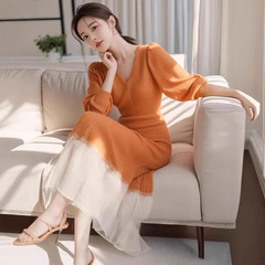 秋季女装2025年新款橘色针织连衣裙子上流社会独特漂亮设计感长裙