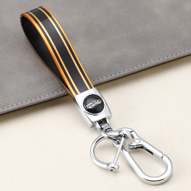 Cuerda de mano de silicona transfronteriza llavero de coche logotipo de coche apellido llavero anti-pérdida llavero de cuerda de mano de silicona duradera