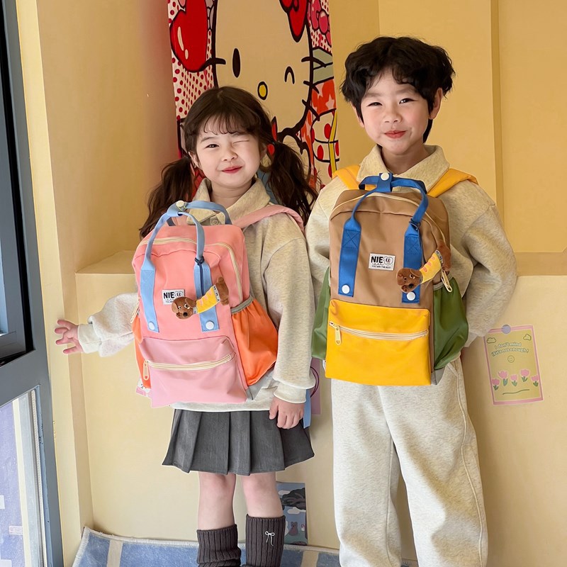 Mochila de moda coreana para niños y niñas, mochila de jardín de infantes, mochila de niños con colgantes de gran capacidad
