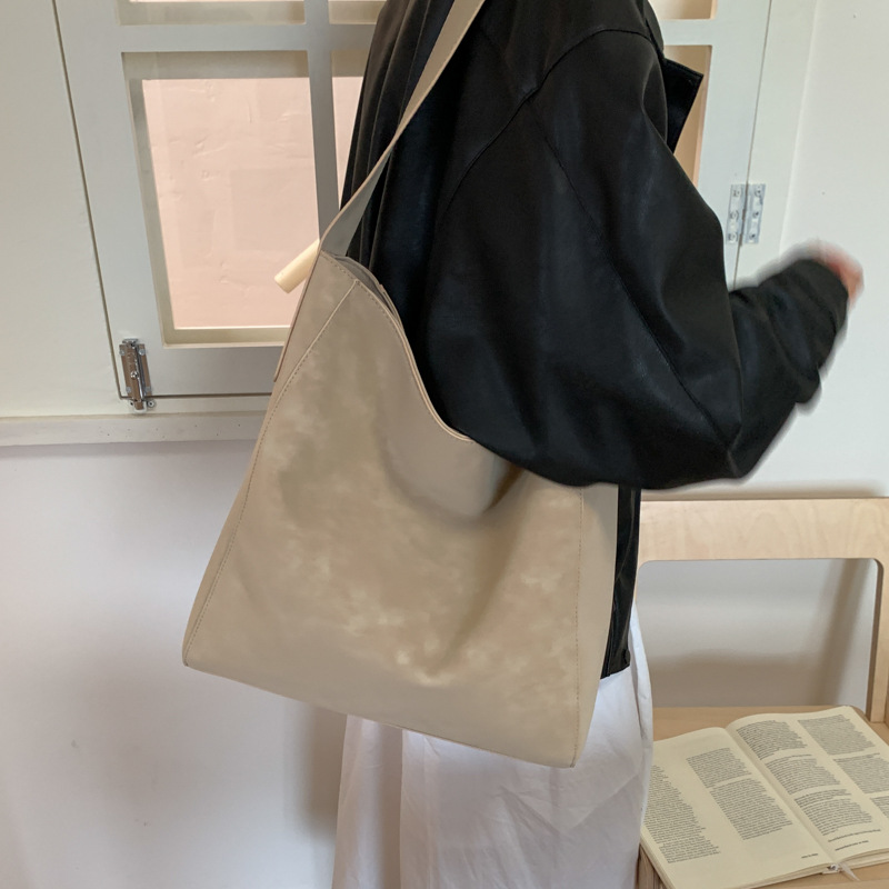 Cross-border 2025 otoño y invierno nuevo retro bolso de braza alta sensación de viaje de gran capacidad bolso de cubo de viaje de mujer bolso de hombro