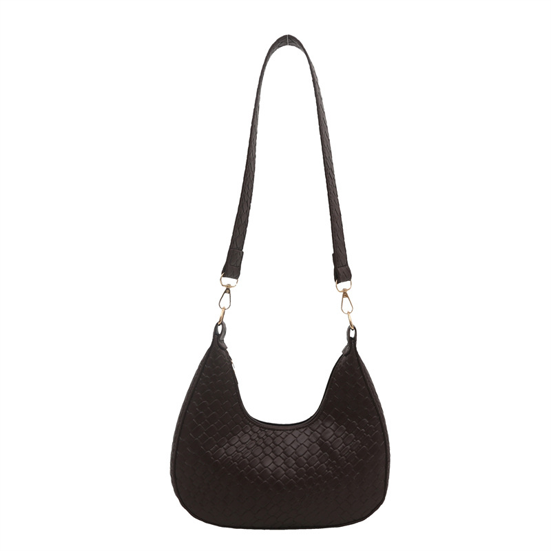 Bolsa de mujer de color sólido 2025, tendencia de primavera, nueva bolsa de brazo coreana tejida, bolso de hombro casual.