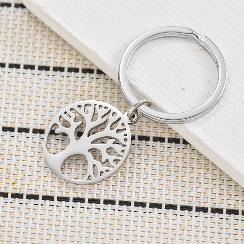 Cross-Border Hot Selling Round Hollow Tree of Life Keychain Stainless Steel Pendant School Bag Pendant Small Gift New Product