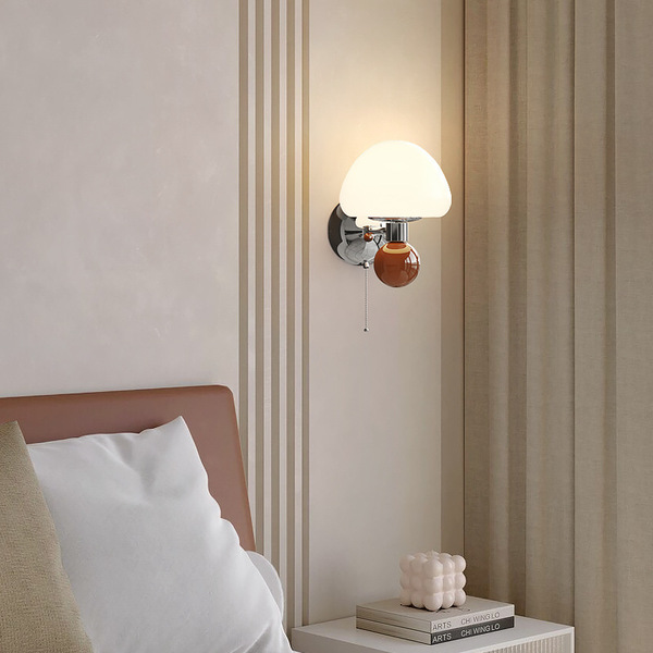 Cream sconce for bed