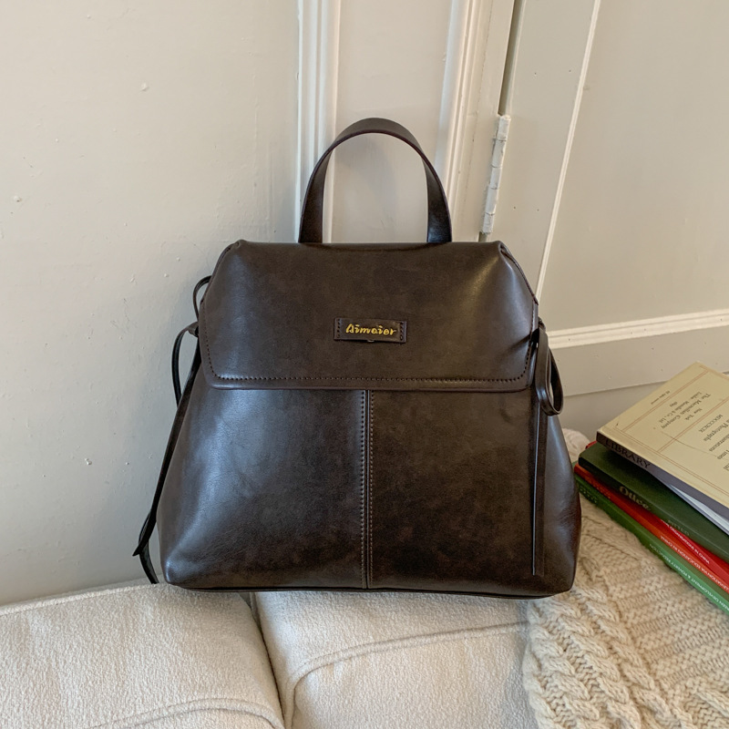 韩版复古蜡油皮双肩包女士休闲旅行背包2025新款学院风学生书包