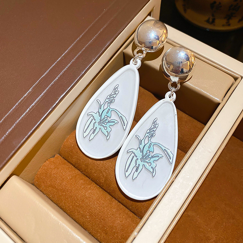 Pendientes de súper hadas de hilo de malla de flor de aguja de plata Pendientes de borla frescos pequeños coreanos Pendientes de estilo de vacaciones de temperamento dulce de nicho