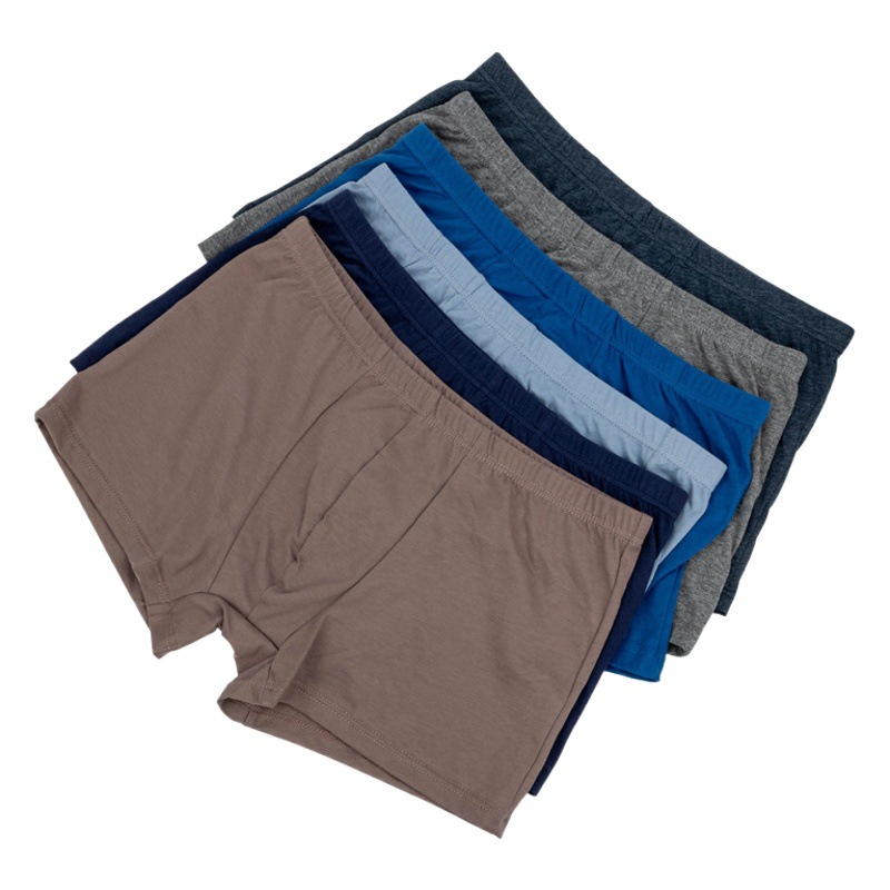 Fabricantes de pantalones interiores de color sólido de hombre, pantalones interiores de hombre transpirables, una al por mayor de pantalones interiores de ángulo plano de hombre