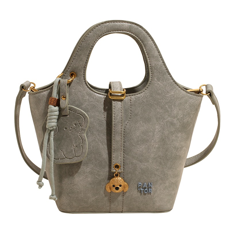 Moda coreana portátil bolso de cubo de agua para mujeres 2025 nuevo nicho simple bolso de hombro de alto nivel bolso de mochila versátil