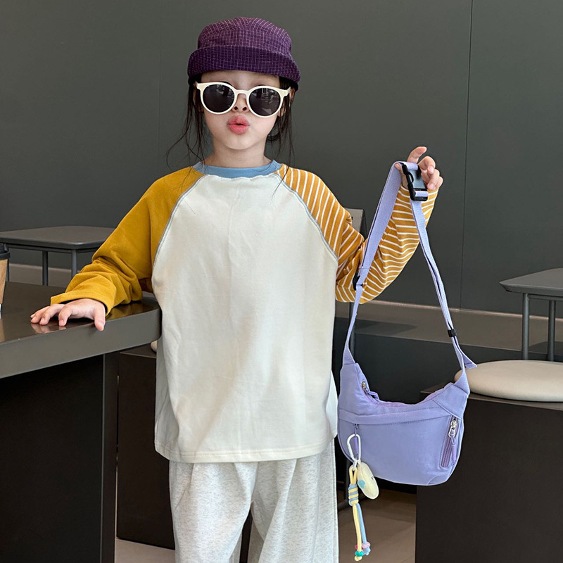 Bolsa de hombro deportiva casual coreana para hombres y mujeres, bolsas de bolsas de bolsas para niños de color sólido.