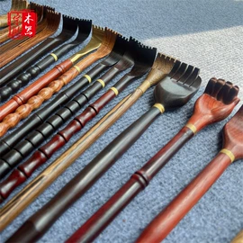 木质工艺品;经络保健器材;美发梳