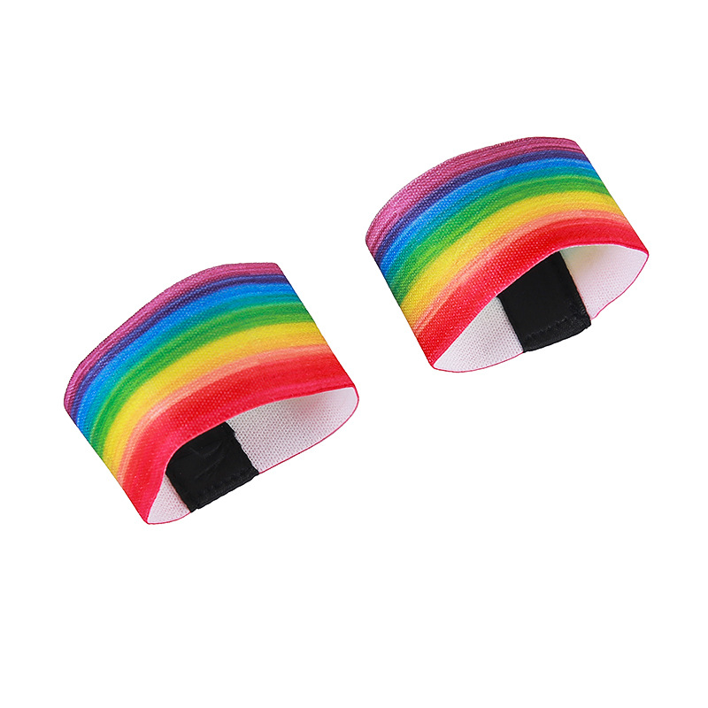 A pair of heat transfer wristbands rainbow