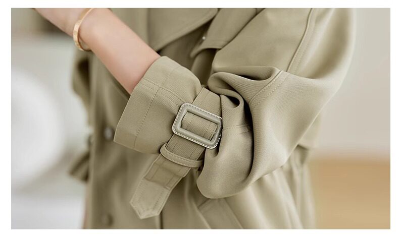 Áo khoác gió kaki nữ dáng ngắn có dây rút, dài tay, cổ lật — Khaki (có sẵn), Đen (Còn hàng) chi tiết 33