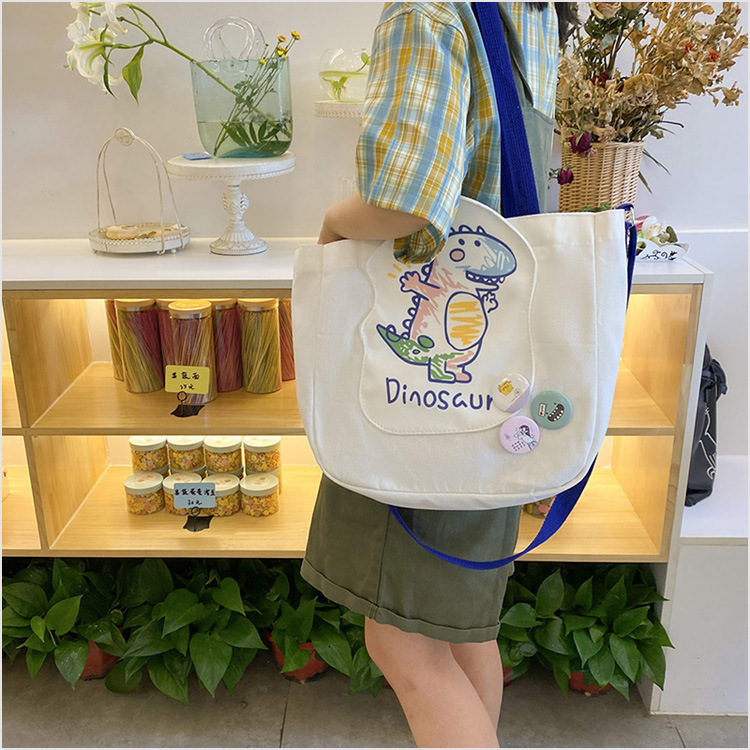 Cute Crossbody Large Capacity Canvas 2021 New Ins Japanese One Shoulder Women's Bag Cute Sister Portable Tote Bag display picture 9