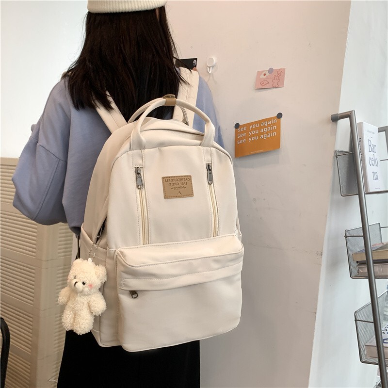 2023 new Japanese junior high school student schoolbag female large capacity backpack simple outdoor commuter computer backpack