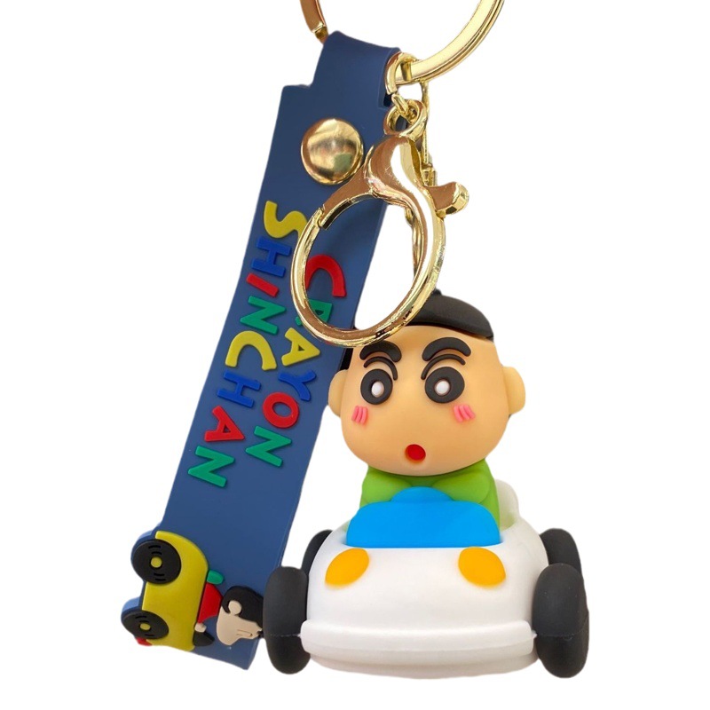 Coche de dibujos animados crayón pequeño llavero nuevo bolso de la muñeca colgante adornos de coche llavero pequeño regalo al por mayor