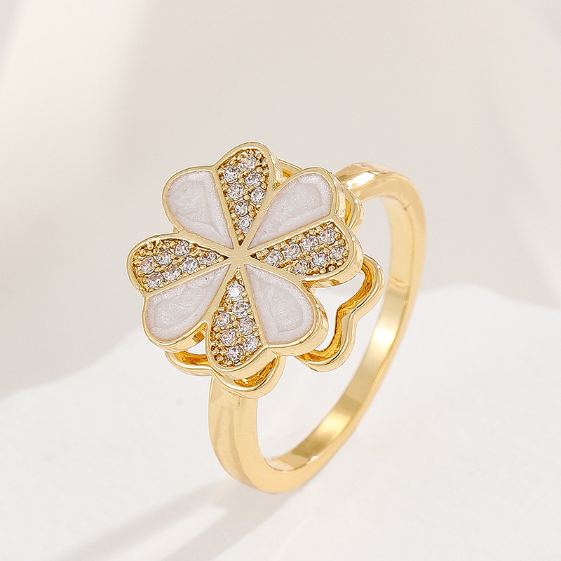 18K oro real color-preservar la suerte de la hierba estilo coreano transfronterizo diamante incrustado rotación de moda abierto anillo ajustable