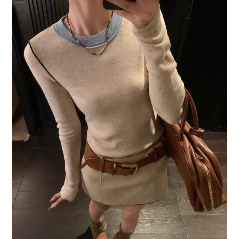 欧陽は色のニットの女性の冬の新型の丸首の中で底のシャツを掛けて身を修めるのがやせている長袖の上着を現します。|undefined