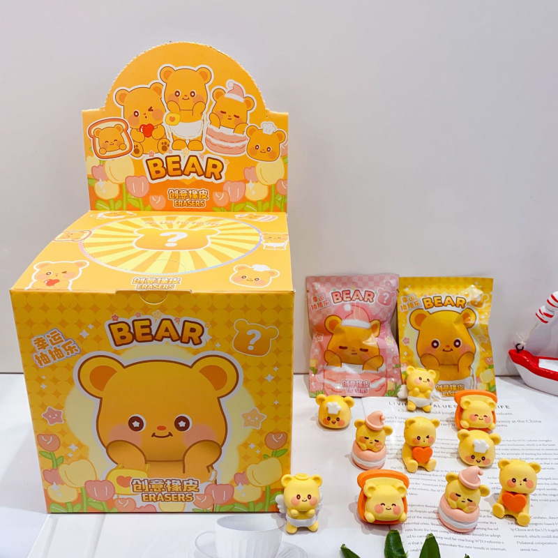 Nuevo oso de mantequilla de dibujos animados bolsas ciegas lindas borradoras de borradoras de estudiantes caja ciega limpia