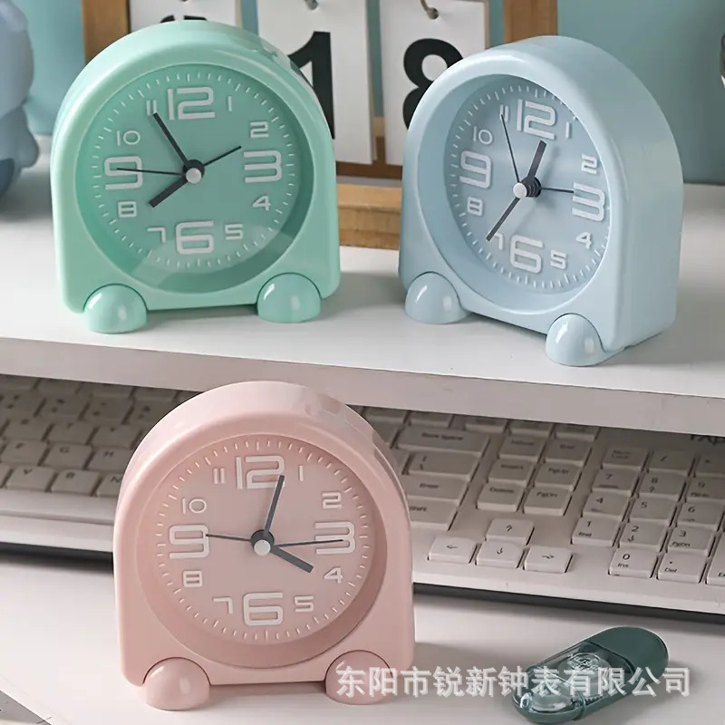 Fabricantes al por mayor nuevo reloj despertador silencioso de dibujos animados de metal gran número protección del medio ambiente lindo escritorio de dormitorio de estudiantes para niños