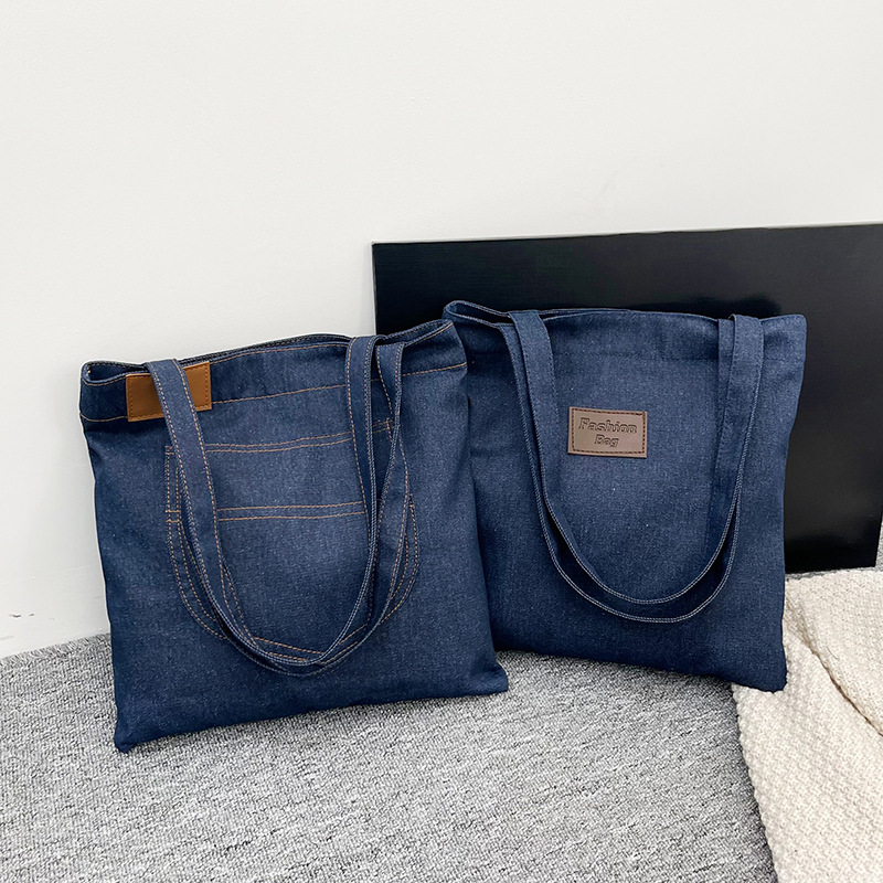 2025 nuevo bolso de lona casual bolso de axila de mujer de gran capacidad bolso de mezclilla Morimeng bolso de la clase de estudiante