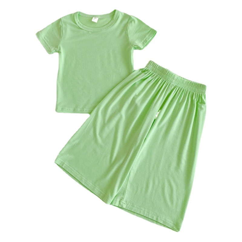 Corea del Sur ropa para niños al por mayor 2024 primavera y verano de los niños delgados color sólido desgaste del hogar traje bebé camiseta 7 pantalones dos piezas