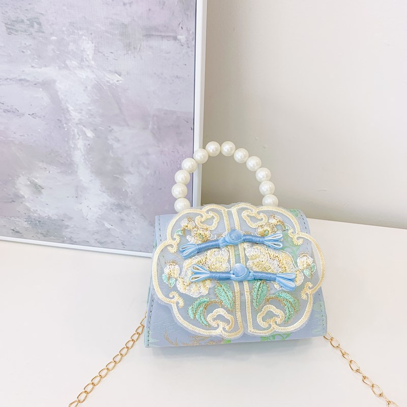 Nuevo estilo chino retro bolso de perla de viento 2025 bolso de cambio sobre rojo bolso de princesa de niñas Hanfu