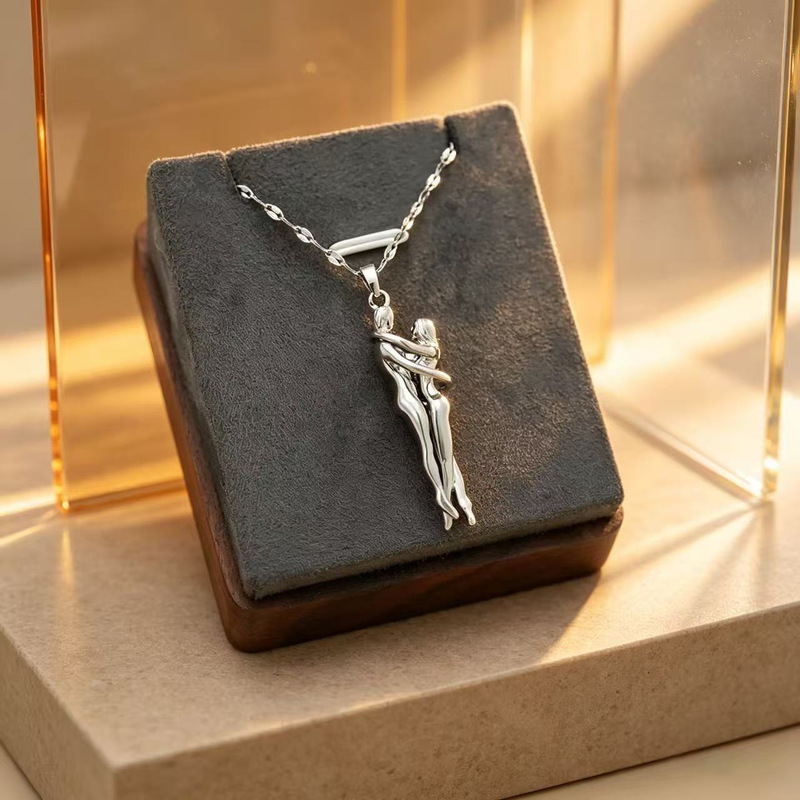 Cross-border TEMU AliExpress best-selling necklace embraces individuality and creativity, featuring a couple of boys and girls embracing each other as a pendant jewelry Cross-border TEMU AliExpress best-selling necklace embraces individuality and creativity, featuring a couple of boys and girls embracing each other as a pendant jewelry