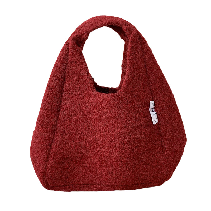 Nuevo otoño y invierno con bolso de lana, bolso de lana de mujer, estilo coreano de alta calidad, simple y versátil bolso de viaje de color sólido.