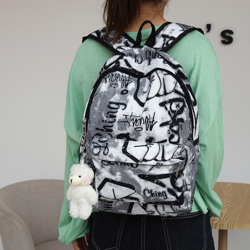 Nuevo estudiante de secundaria mochila personalizada carta graffiti mochila pareja de gran capacidad mochila bolso de viaje moda