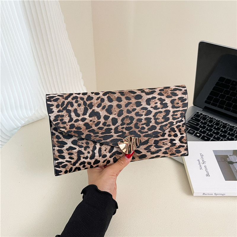 2025 otoño nuevo bolso de mano personalizado sobre bolso de mujer bolso de mano impresión leopardo personalidad moda temperamento bolsa de cena