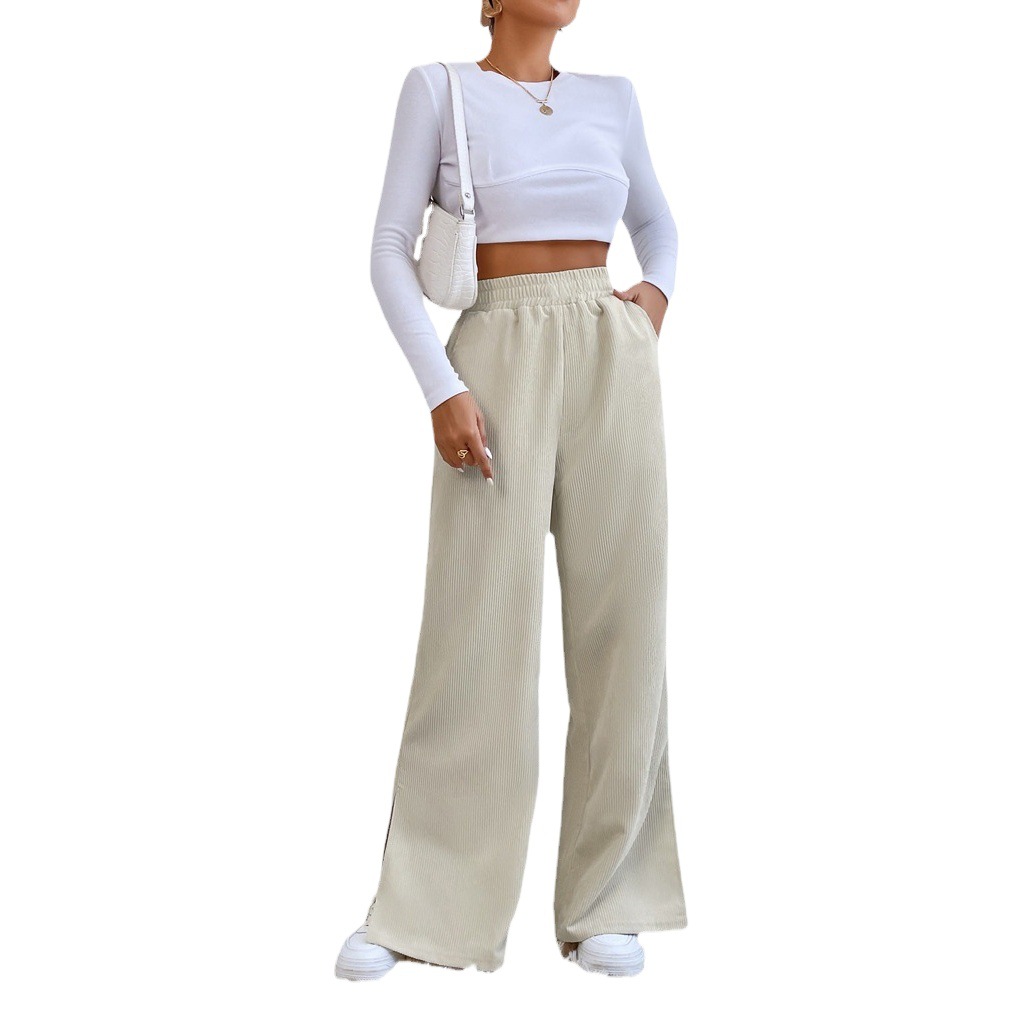 2023 Otoño e Invierno nuevos pantalones casuales de cintura alta de las mujeres pantalones de pana de color sólido europeo y americano