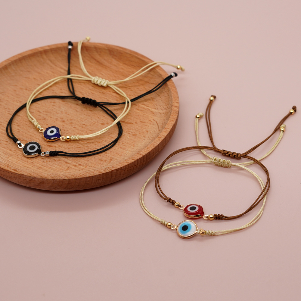 Pulseira de berloques olho grego com contas douradas_voghion.com
