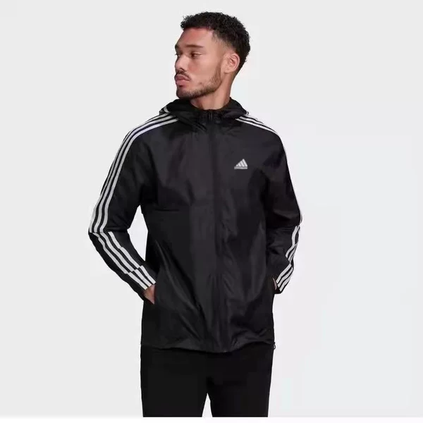 Trendy men's windbreaker jacket with three stripes, suitable for spring, autumn, and summer, a casual and sporty hooded jacket for couples, breathable