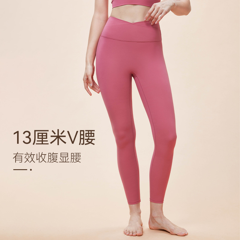 Primavera y verano nuevos pantalones de yoga deportivos desnudos V cintura apretada pantalonada de mel桃ar para correr pantalones de fitness deportivos para mujeres