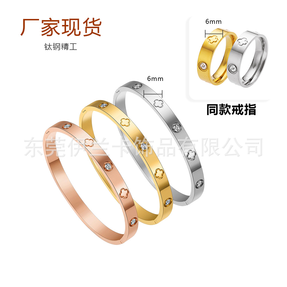 Estilo coreano hebilla de apertura de 6mm de oro rosa 18K afortunado Flor de cuatro hojas de diamantes pulsera de acero de titanio fábrica en stock al por mayor
