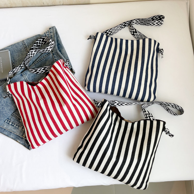 Bolsa de lona de hombro a rayas coreanas para mujeres 2025 nueva bolsa de mano de arte retro gran capacidad bolsa de viaje de moda