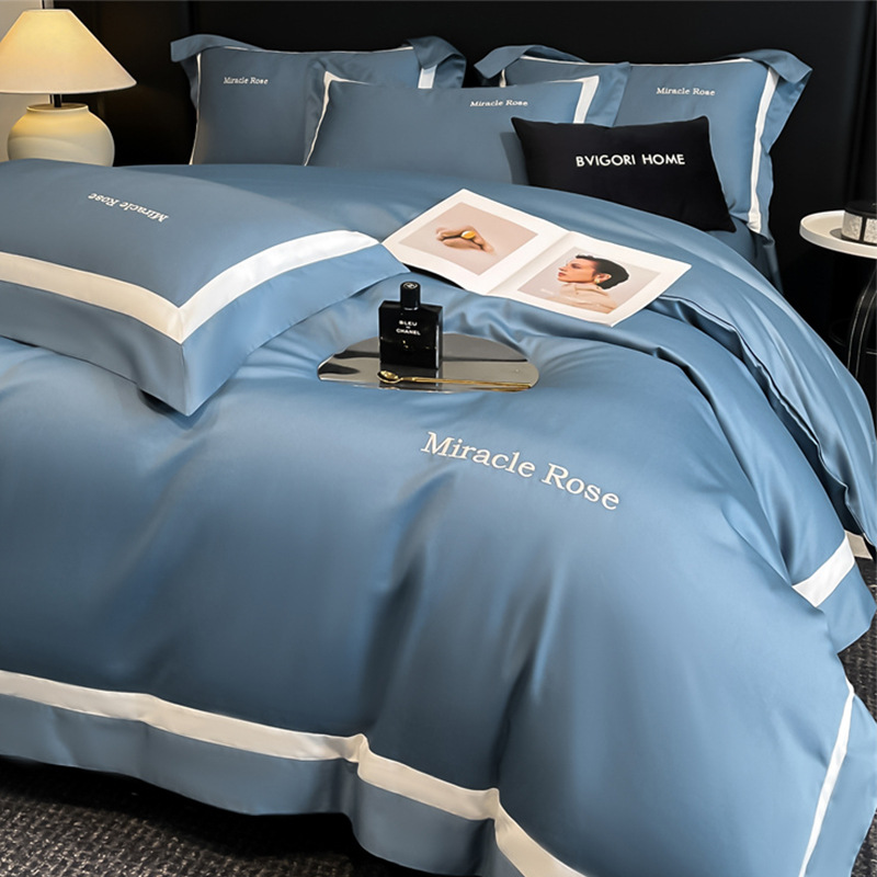 Cama de algodón de lujo ligero de alta gama de cuatro piezas de algodón 2025 nueva ropa de cama de tres piezas con funda de edredón de alta calidad