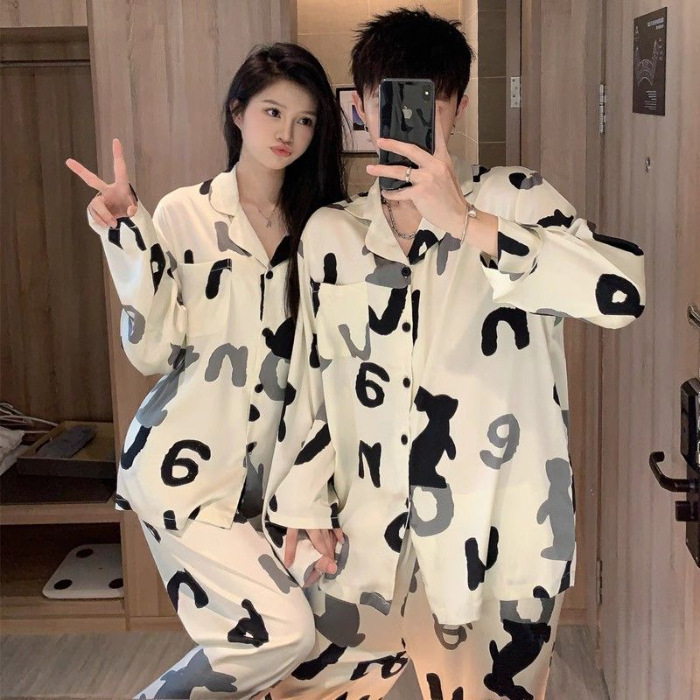 Pajamas de tinta de alto nivel de primavera y otoño de mujeres de manga larga seda de hielo de verano delgada ropa de seda para hombres