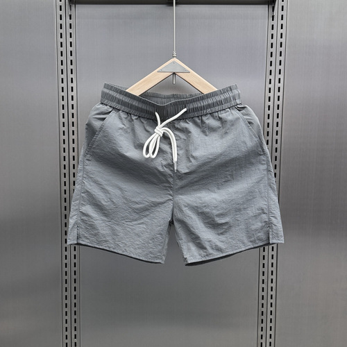Stylish, slim-fit, breathable, quick-drying men's shorts 2025 trendy brand casual three-quarter pants couple drawstring plain beach shorts