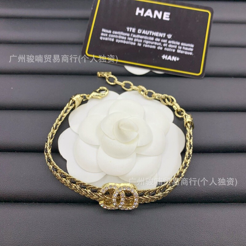 High-End Fragrance Brand Letter Double C Full Diamond Snake Bone Chain Black and White Leather Rope Bracelet for Women, Grandma-Style Jewelry Wholesale Dropshipping High-End Fragrance Brand Letter Double C Full Diamond Snake Bone Chain Black and White Leather Rope Bracelet for Women, Grandma-Style Jewelry Wholesale Dropshipping