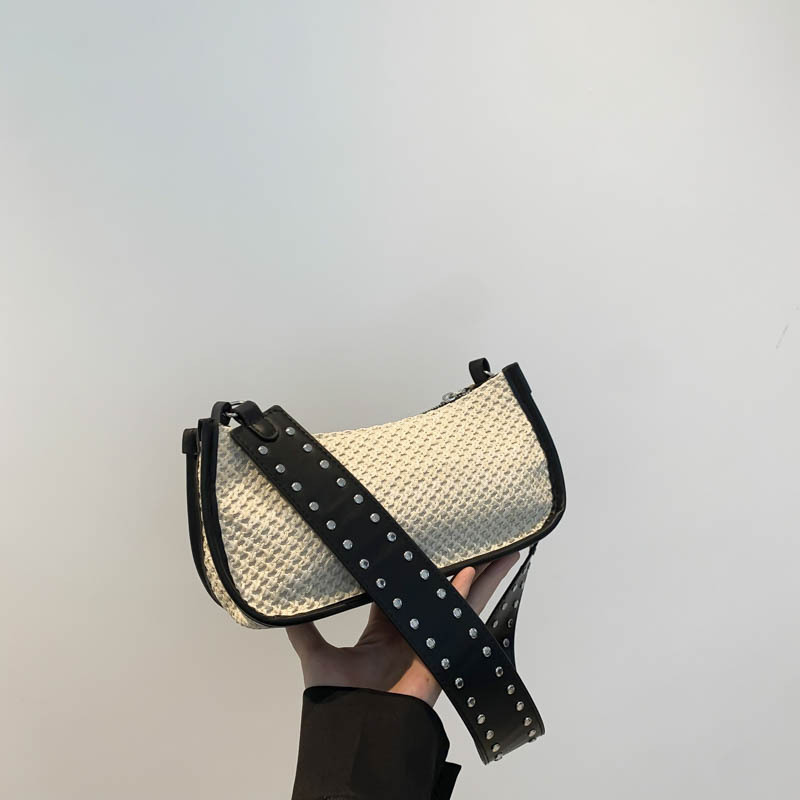 Bolsa trenzada debajo de la axila damas 2024 nuevo estilo ligero de lujo nicho de alta sensación de verano de vacaciones en la playa pastoral bolsa de paja