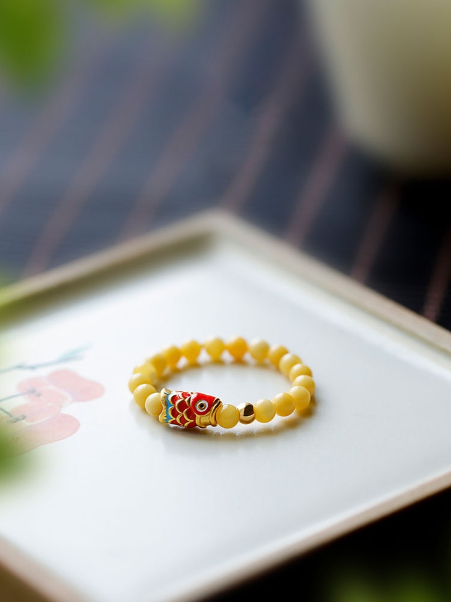 Retro golden small design fashionable elegant sophisticated ring wax…